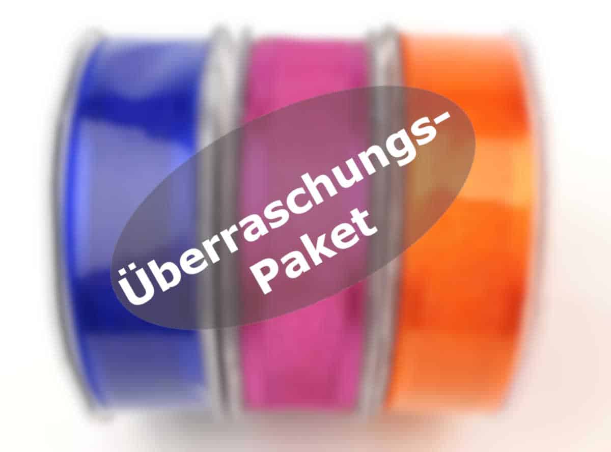 Surprise package with 3 ribbons