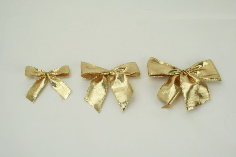 Lamé ribbon bow, gold, to glue on