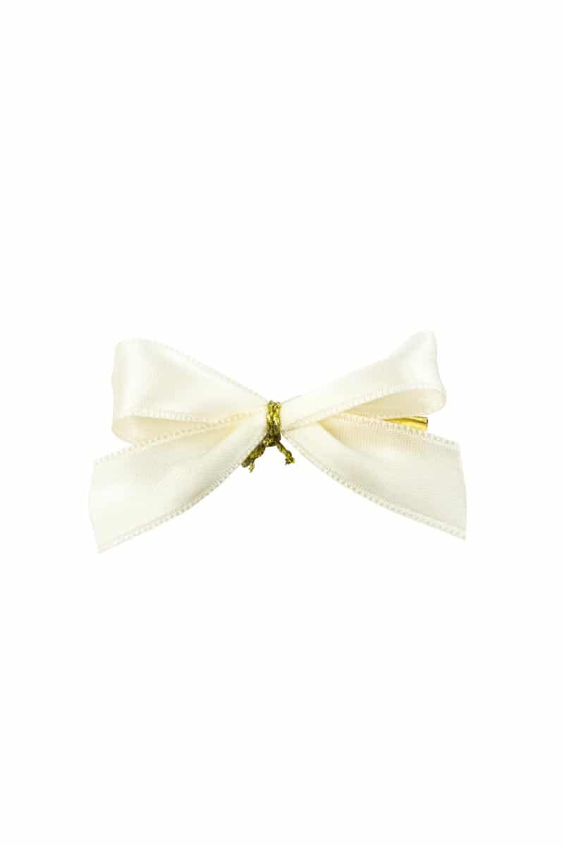 Finished bow made of 15 mm satin ribbon, cream, with clip
