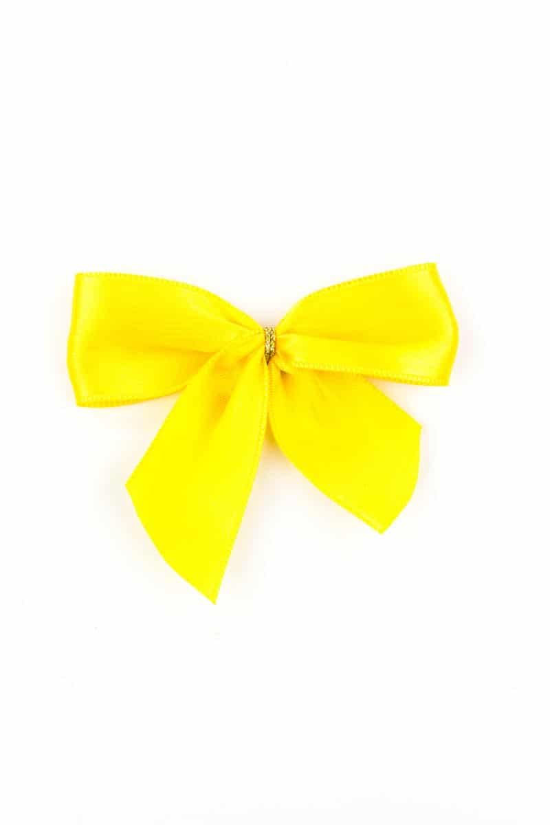 finished bow made of 25 mm satin tape, yellow, with adhesive dot