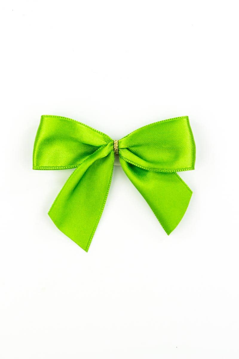 Finished bow made of 25 mm satin tape, green, with adhesive dot